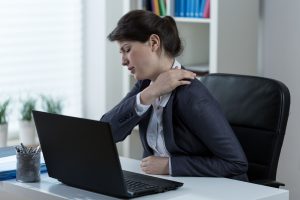 38156472 - businesswoman leading sedentary lifestyle causing back pain