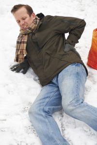 50154983 - man slipping over in snowy street